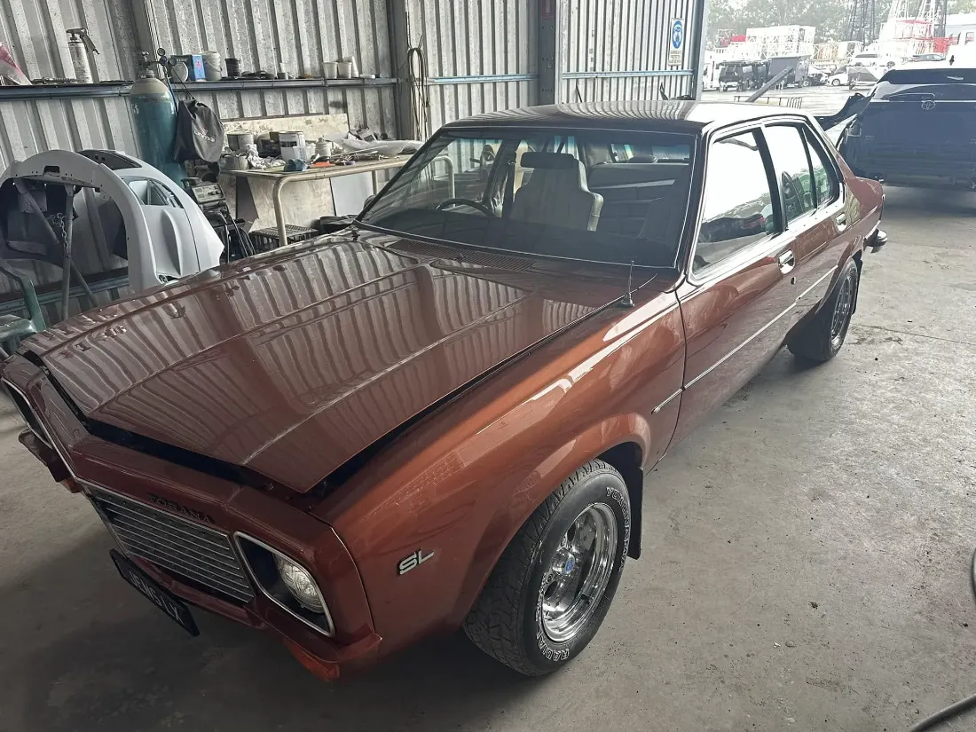 Australian classic sedan in a workshop during a restoration