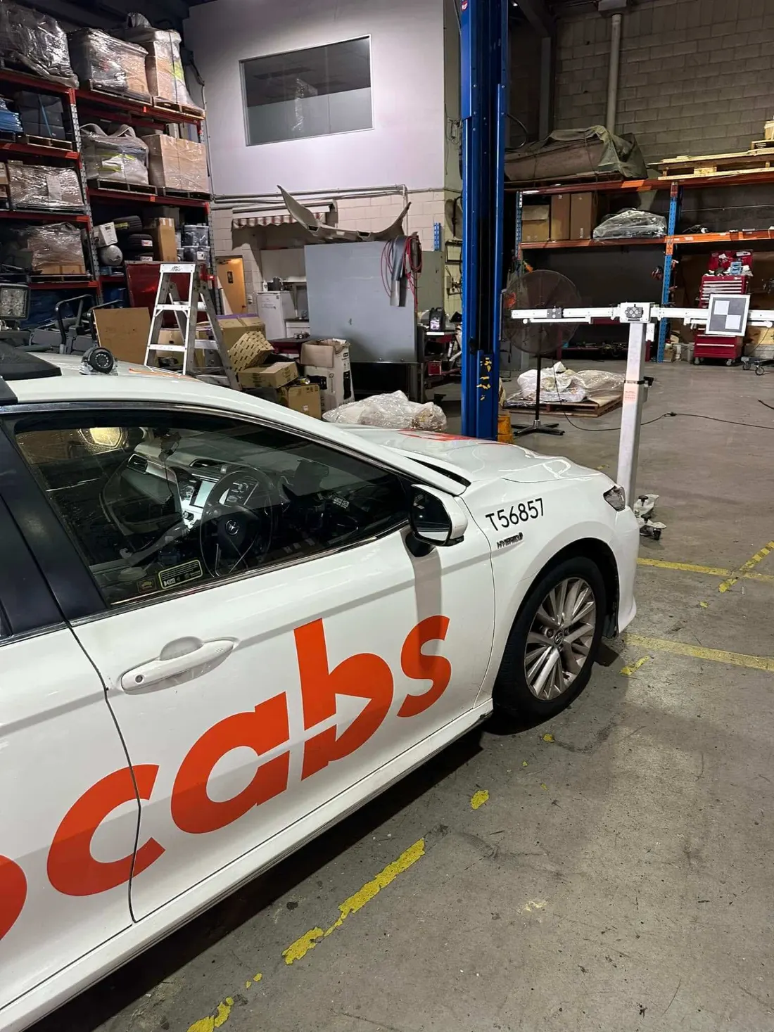 Car on the ADAS calibration rig after a windscreen replacement